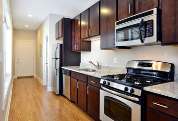 Fully equipped kitchen at The Belmont by Reside Flats, Chicago, IL,60657